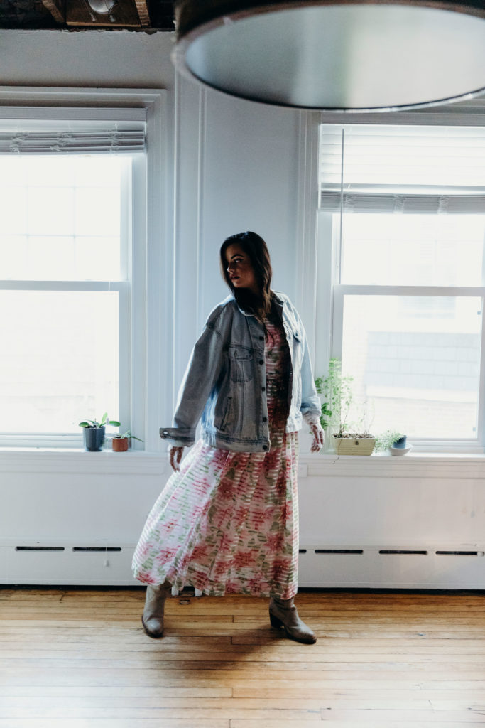 An oversized denim jacket is always a good choice to throw on, and when we saw this one from Charlie Dog Vintage we knew it'd be perfect. We think it's spectacular over this 70s floral printed silk gown.